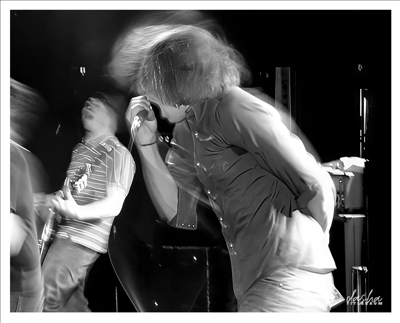 The Reunion Show II, Second frame from the same run, focused on interplay between band members.